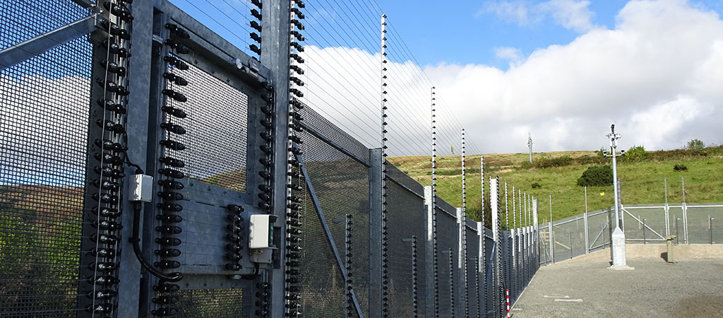 The image shows a high-security solution from Crime and Fire Defence Systems, including intelligent fencing and Campost.